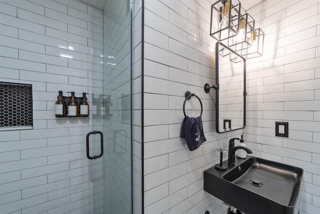 2 Mulvey St, Saint Augustine, FL 32084 - bathroom with a shower stall and a chandelier