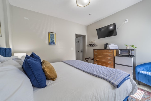 2 Mulvey St, Saint Augustine, FL 32084 - bedroom featuring freestanding refrigerator