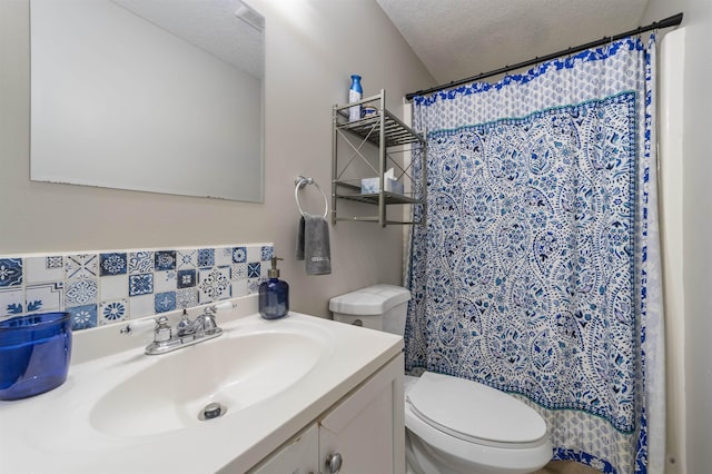 2 Mulvey St, Saint Augustine, FL 32084 - bathroom featuring a textured ceiling, vanity, backsplash, and curtained shower