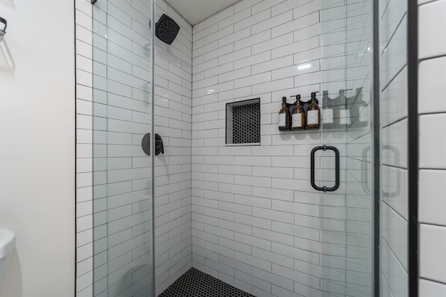 bathroom featuring walk in shower