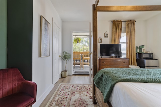 2 Mulvey St, Saint Augustine, FL 32084 - bedroom with wood finished floors and access to outside