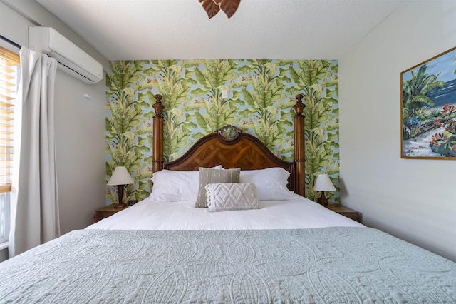 2 Mulvey St, Saint Augustine, FL 32084 - bedroom with an AC wall unit, wallpapered walls, and an accent wall