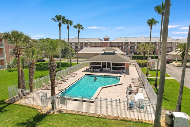 210 16th Street Unit J, Saint Augustine Beach, FL 32080 - community pool with a patio area and a residential view
