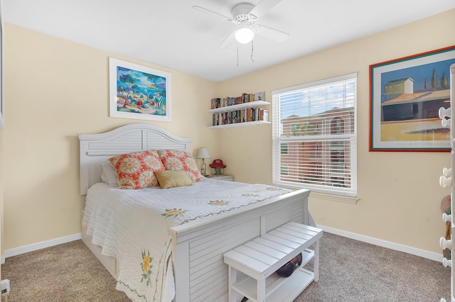 210 16th Street Unit J, Saint Augustine Beach, FL 32080 - carpeted bedroom featuring baseboards and ceiling fan
