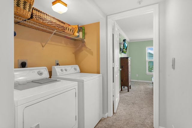210 16th Street Unit J, Saint Augustine Beach, FL 32080 - washroom featuring light colored carpet and washer and clothes dryer