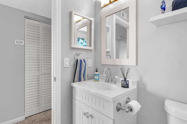 210 16th Street Unit J, Saint Augustine Beach, FL 32080 - bathroom with a closet and vanity
