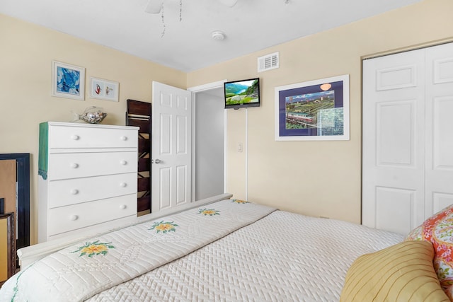 210 16th Street Unit J, Saint Augustine Beach, FL 32080 - bedroom featuring a closet and ceiling fan