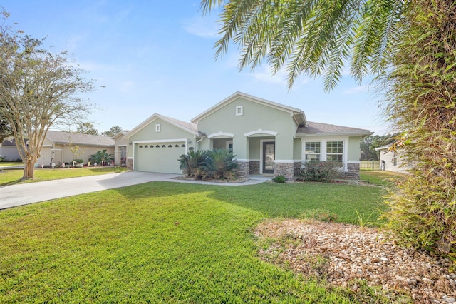 view of front of house featuring a garage and a front yard