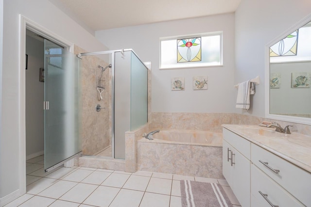 bathroom with shower with separate bathtub, vanity, and plenty of natural light