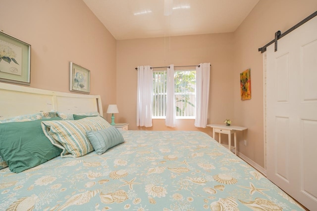 bedroom with a barn door