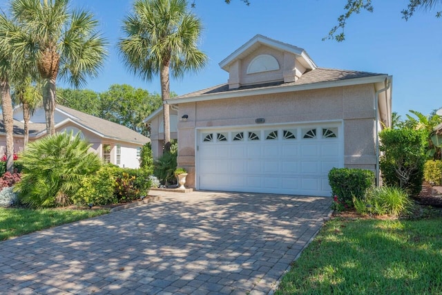 view of front of property featuring a garage