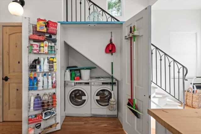 91 Oneida St, Saint Augustine, FL 32084 - laundry area featuring wood finished floors, washer and dryer, and laundry area