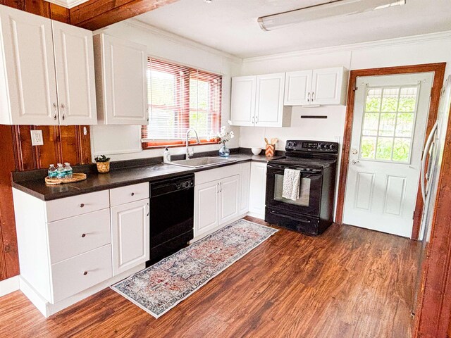 240 Ravenswood Dr, Saint Augustine, FL 32084 - living area with wood walls, a ceiling fan, hardwood / wood-style flooring, and a fireplace