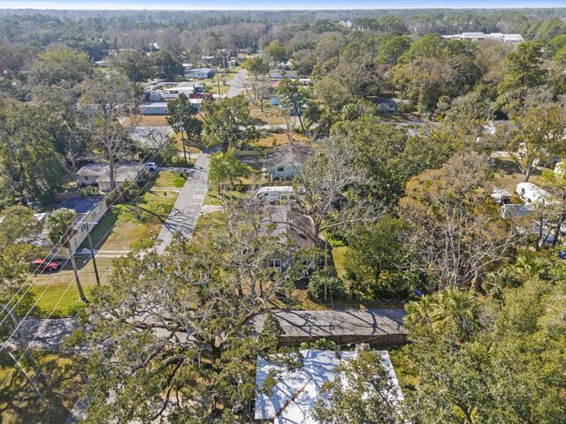 240 Ravenswood Dr, Saint Augustine, FL 32084 - back of house with a yard, a chimney, and central air condition unit