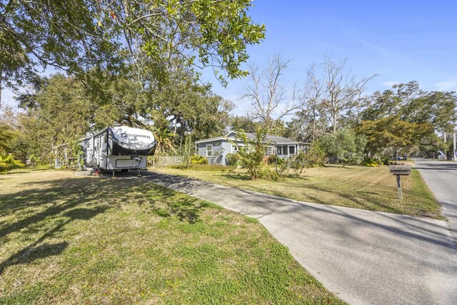240 Ravenswood Dr, Saint Augustine, FL 32084 - bathroom with tile walls, wainscoting, and toilet