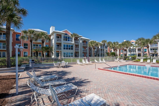 view of swimming pool featuring a patio area