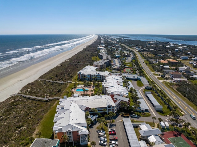 drone / aerial view with a view of the beach and a water view