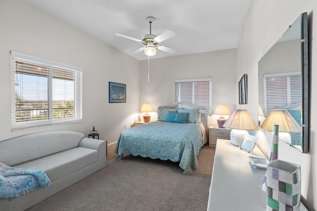 carpeted bedroom with ceiling fan