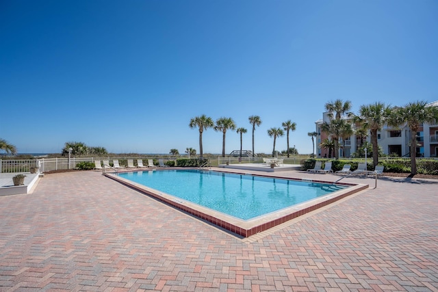 view of swimming pool featuring a patio