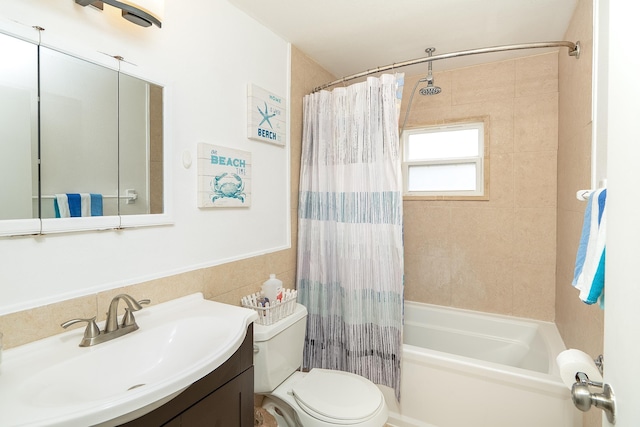 full bathroom with vanity, toilet, and shower / bath combo with shower curtain