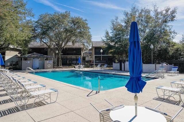 view of swimming pool featuring a patio