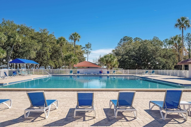 view of swimming pool featuring a patio