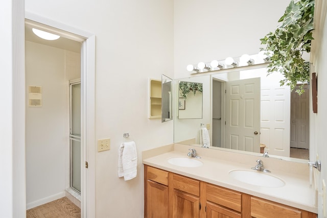 bathroom featuring vanity and walk in shower