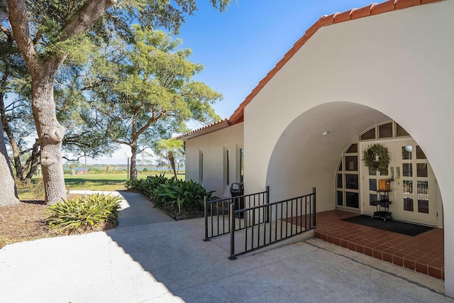 view of patio featuring french doors