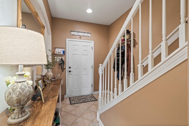 entrance foyer with light tile patterned flooring