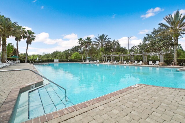 view of pool featuring a pergola