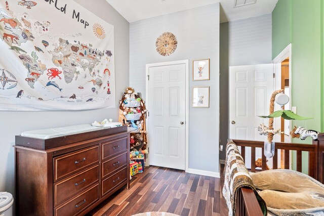 bedroom featuring dark hardwood / wood-style floors