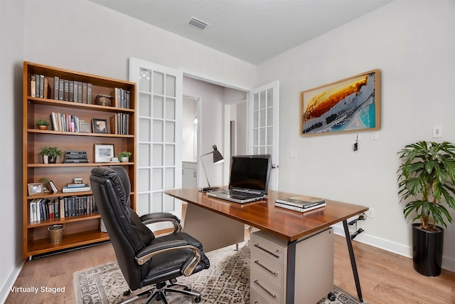 home office featuring light wood-type flooring