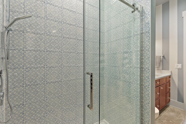 214 Pelican Reef Dr, Saint Augustine, FL 32080 - full bath featuring a stall shower, marble finish floor, toilet, and vanity