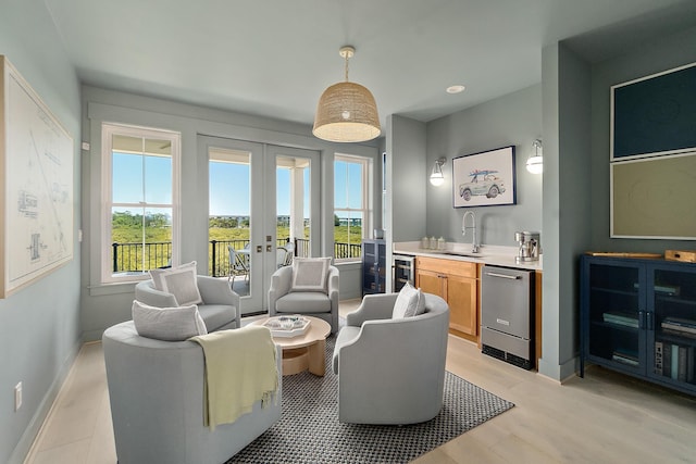 214 Pelican Reef Dr, Saint Augustine, FL 32080 - interior space featuring a wealth of natural light, french doors, indoor wet bar, and wine cooler
