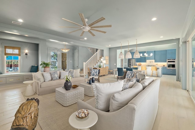 214 Pelican Reef Dr, Saint Augustine, FL 32080 - living area with recessed lighting, stairway, ceiling fan, light wood finished floors, and visible vents