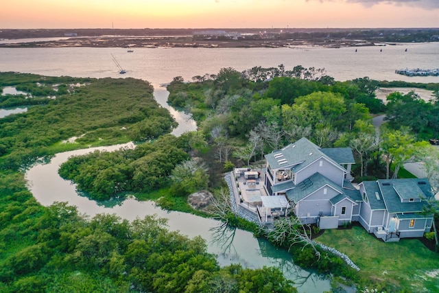 214 Pelican Reef Dr, Saint Augustine, FL 32080 - aerial view at dusk featuring a water view