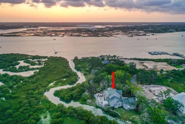 214 Pelican Reef Dr, Saint Augustine, FL 32080 - aerial view at dusk featuring a water view