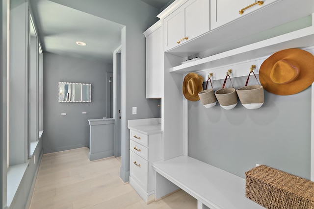 214 Pelican Reef Dr, Saint Augustine, FL 32080 - mudroom with baseboards and light wood-style flooring