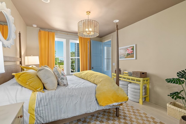 214 Pelican Reef Dr, Saint Augustine, FL 32080 - bedroom featuring a chandelier