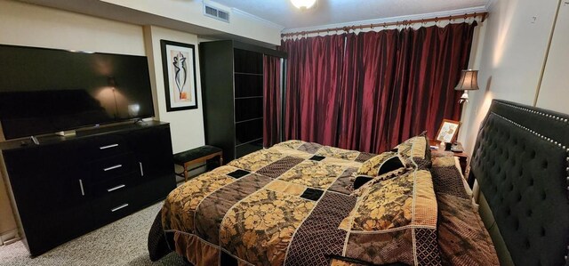 2 Dondanville Rd Unit 216, Saint Augustine Beach, FL 32080 - bedroom featuring carpet floors and ornamental molding