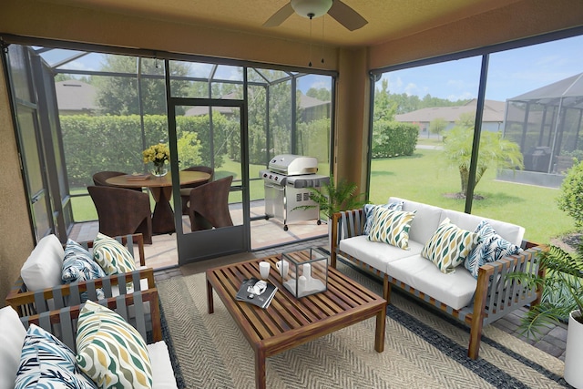 sunroom / solarium with an outdoor living space, ceiling fan, and outdoor dining area