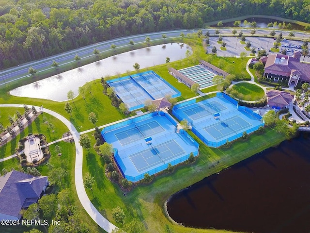 bird's eye view featuring a water view and a forest view