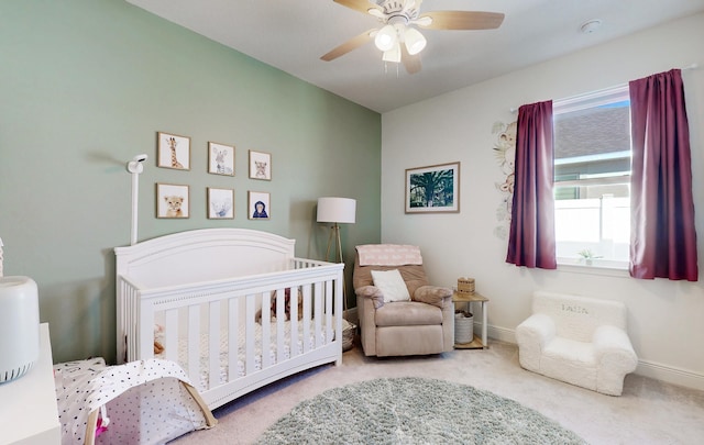 59 Oakleaf Way, Palm Coast, FL 32137 - carpeted bedroom with a nursery area, baseboards, and multiple windows
