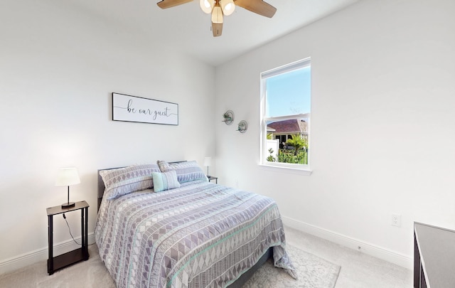 59 Oakleaf Way, Palm Coast, FL 32137 - bedroom featuring light carpet, baseboards, and ceiling fan