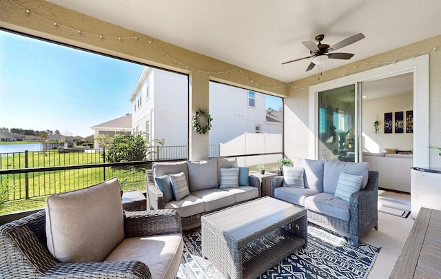 59 Oakleaf Way, Palm Coast, FL 32137 - sunroom featuring outdoor lounge area, a water view, and a ceiling fan