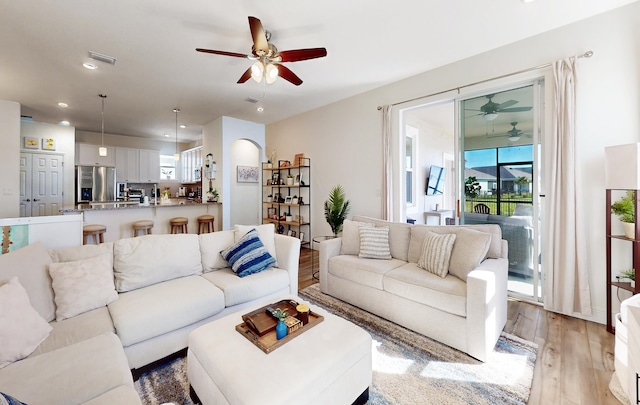 59 Oakleaf Way, Palm Coast, FL 32137 - living area featuring a healthy amount of sunlight, recessed lighting, light wood finished floors, and ceiling fan