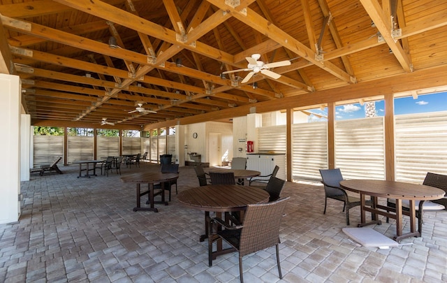 59 Oakleaf Way, Palm Coast, FL 32137 - exterior space featuring outdoor dining area, fence, and ceiling fan