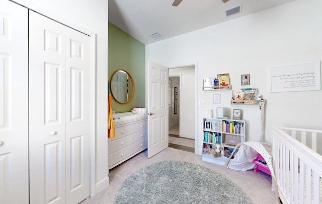 59 Oakleaf Way, Palm Coast, FL 32137 - bedroom featuring a closet, visible vents, and carpet floors