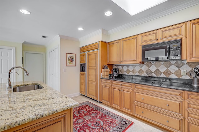 1 Sandpiper Cv, Ponte Vedra Beach, FL 32082 - kitchen with black microwave, electric stovetop, light stone countertops, tasteful backsplash, and ornamental molding