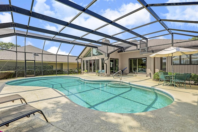 1 Sandpiper Cv, Ponte Vedra Beach, FL 32082 - outdoor pool with a patio and glass enclosure